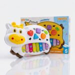 VACA CON LUZ Y SONIDO 22X16X5CM ART 53349 HAO
